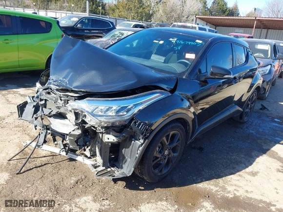 2021 Toyota C-HR LE with VIN JTNKHMBX2M1098138, listed as a IAAI auction lot 41679903 with 49,390 mi miles. Bid and sale history available at carsss.com. Image 2.