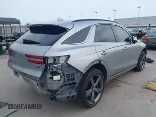 2024 Genesis GV70 Sport z VIN 5NMMCDTC6RH013693, wystawiony jako IAAI lot #42316363 z przebiegiem 4 824 mil mil oraz . Historia ofert i sprzedaży dostępna na DreamBid. Obrazek 4.