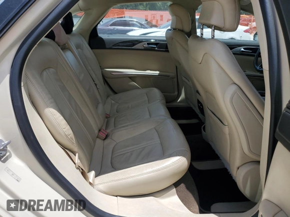 2014 Lincoln MKZ with VIN 3LN6L2G96ER817767, listed as a Copart auction lot 56537015 with 127,373 mi miles and Salvage title. Bid and sale history available at DreamBid. Image 10.