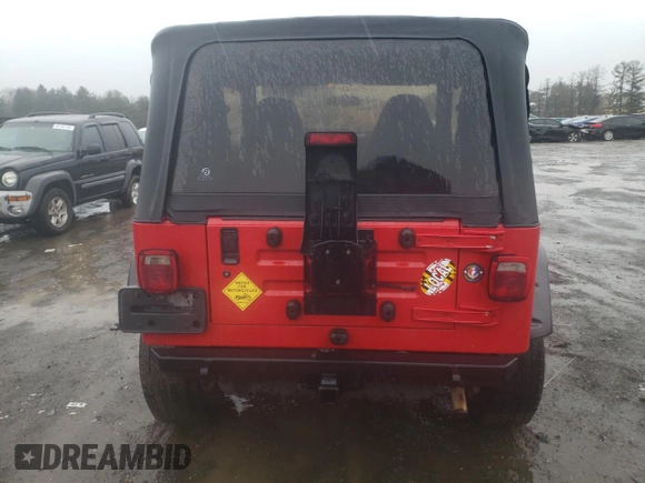 2002 Jeep Wrangler SE with VIN 1J4FA29P02P715013, listed as a Copart auction lot 48039035 with 193,583 mi miles and Salvage Title. Bid and sale history available at DreamBid. Image 6.