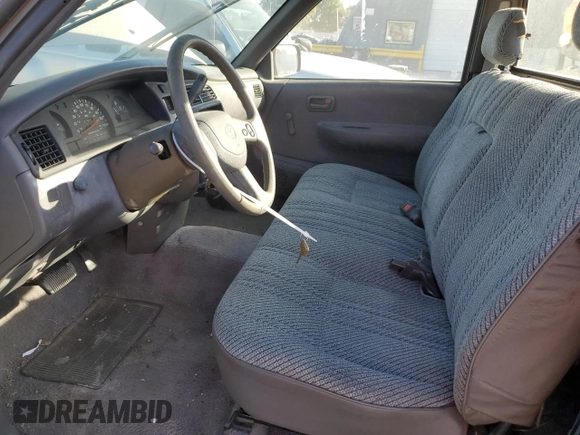 1993 Toyota T100 DX with VIN JT4VD10A9P0013784, listed as a Copart auction lot 76407064 with 307,925 mi miles and Clean Title. Bid and sale history available at DreamBid. Image 7.