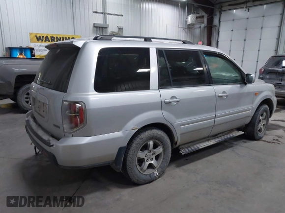 2007 Honda Pilot EX-L with VIN 2HKYF18607H511219, listed as a IAAI auction lot 41368619 with 270,722 mi miles and . Bid and sale history available at DreamBid. Image 4.