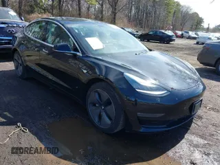 2020 Tesla Model 3 Long Range with VIN 5YJ3E1EB6LF600266, listed as a IAAI auction lot 41819374 with 28,406 mi miles. Bid and sale history available at carsss.com. Image 1.