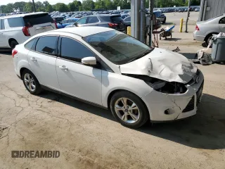 2013 Ford Focus SE with VIN 1FADP3F21DL315133, listed as a Copart auction lot 60502705 with 123,504 mi miles and Salvage title. Bid and sale history available at DreamBid. Image 4.