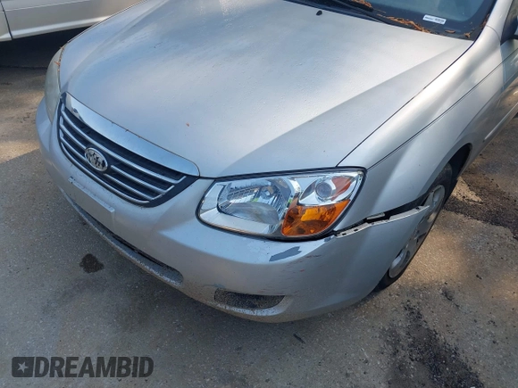 2009 Kia Spectra EX with VIN KNAFE221695647240, listed as a IAAI auction lot 41994191 with 237,101 mi miles. Bid and sale history available at carsss.com. Image 6.