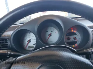 2004 Toyota MR2 z VIN JTDFR320840070477, wystawiony jako Copart lot #77913024 z przebiegiem 60 694 mil mil oraz Szkoda całkowita • Salvage title. Historia ofert i sprzedaży dostępna na DreamBid. Obrazek 9.