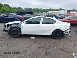 2025 Toyota Camry LE z VIN 4T1DAACK6SU545886, wystawiony jako IAAI lot #42120578 z przebiegiem Nie podano mil oraz . Historia ofert i sprzedaży dostępna na DreamBid. Obrazek 15.