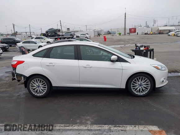 2012 Ford Focus SEL with VIN 1FAHP3H27CL314291, listed as a IAAI auction lot 41859207 with 86,830 mi miles. Bid and sale history available at carsss.com. Image 14.