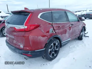 2018 Honda CR-V Touring with VIN 5J6RW1H95JL006062, listed as a IAAI auction lot 41072002 with 50,930 mi miles and . Bid and sale history available at DreamBid. Image 4.