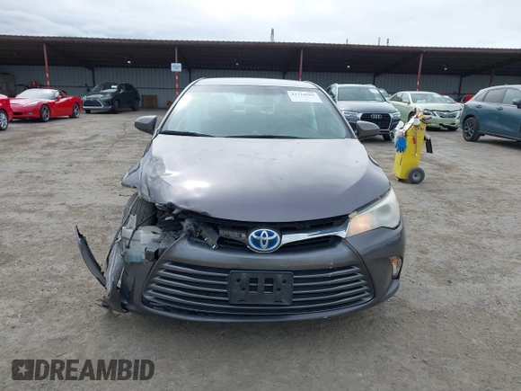 2017 Toyota Camry Hybrid LE with VIN 4T1BD1FK9HU216117, listed as a IAAI auction lot 41710989 with 99,595 mi miles. Bid and sale history available at carsss.com. Image 12.