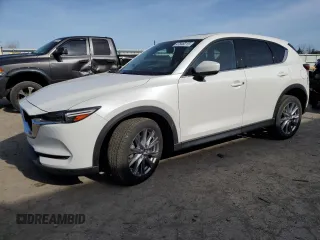 2020 Mazda CX-5 Grand Touring with VIN JM3KFBDM0L1810699, listed as a Copart auction lot 47846215 with 61,441 mi miles and Salvage Title. Bid and sale history available at carsss.com. Image 1.