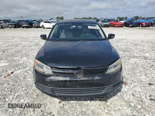2012 Volkswagen Jetta SE with VIN 3VWDX7AJ3CM114196, listed as a Copart auction lot 61236545 with 128,893 mi miles and Salvage title. Bid and sale history available at DreamBid. Image 5.