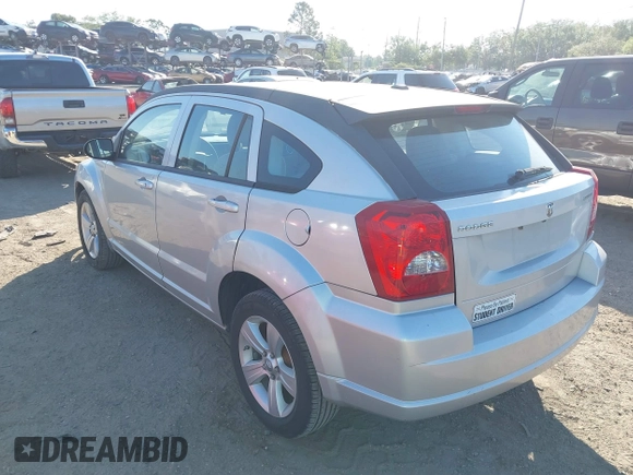 2011 Dodge Caliber Mainstreet with VIN 1B3CB3HA9BD126117, listed as a IAAI auction lot 41897907 with 85,026 mi miles and . Bid and sale history available at DreamBid. Image 3.
