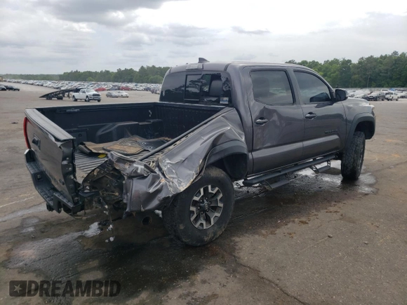 2018 Toyota Tacoma SR with VIN 5TFCZ5AN1JX147799, listed as a Copart auction lot 54337455 with 189,899 mi miles and Salvage Title. Bid and sale history available at DreamBid. Image 3.