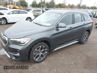 2021 BMW X1 xDrive28i with VIN WBXJG9C06M5S05303, listed as a IAAI auction lot 41060130 with 29,644 mi miles. Bid and sale history available at carsss.com. Image 19.