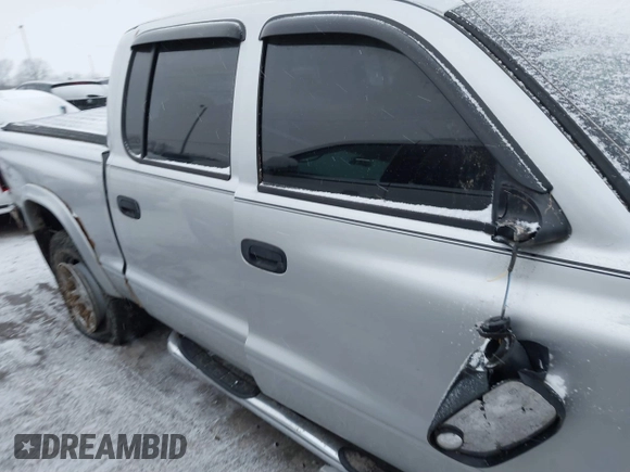 2004 Dodge Dakota SLT with VIN 1D7HG48N34S665027, listed as a IAAI auction lot 41395509 with 128,064 mi miles. Bid and sale history available at carsss.com. Image 13.