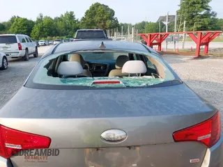2013 Kia Optima LX z VIN 5XXGM4A79DG200479, wystawiony jako IAAI lot #42412641 z przebiegiem 183 916 mil mil oraz . Historia ofert i sprzedaży dostępna na DreamBid. Obrazek 6.