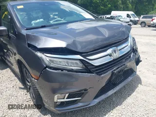 2018 Honda Odyssey Elite with VIN 5FNRL6H95JB087952, listed as a IAAI auction lot 42579817 with 96,577 mi miles and . Bid and sale history available at DreamBid. Image 20.