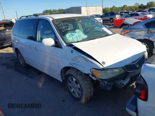 2002 Honda Odyssey EX z VIN 2HKRL18602H522128, wystawiony jako IAAI lot #40879648 z przebiegiem Nie podano mil oraz . Historia ofert i sprzedaży dostępna na DreamBid. Obrazek 1.