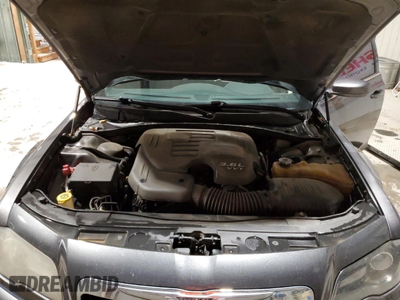 2013 Chrysler 300 with VIN 2C3CCABG3DH621792, listed as a Copart auction lot 37748134 with 202,963 mi miles and Salvage Title. Bid and sale history available at carsss.com. Image 11.