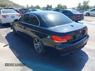 2007 BMW 3 Series 335i with VIN WBAWL73517PX49275, listed as a IAAI auction lot 41654471 with 203,928 mi miles. Bid and sale history available at carsss.com. Image 3.