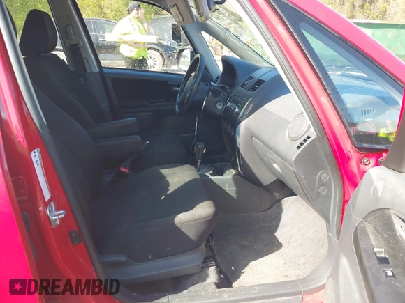 2010 Suzuki SX4 with VIN JS2YB5A34A6301801, listed as a IAAI auction lot 41884838 with 124,381 mi miles. Bid and sale history available at carsss.com. Image 5.