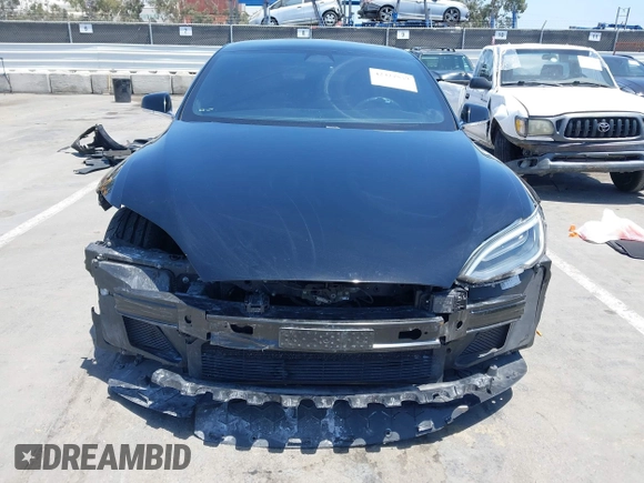 2017 Tesla Model S 60 with VIN 5YJSA1E17HF232699, listed as a IAAI auction lot 42327539 with 113,923 mi miles and . Bid and sale history available at DreamBid. Image 6.