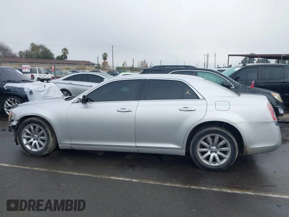 2011 Chrysler 300 Limited with VIN 2C3CA5CG9BH614354, listed as a IAAI auction lot 41216730 with 141,670 mi miles. Bid and sale history available at carsss.com. Image 15.