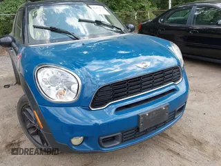 2012 MINI Countryman S z VIN WMWZC3C51CWL81251, wystawiony jako IAAI lot #42452794 z przebiegiem 113 865 mil mil oraz . Historia ofert i sprzedaży dostępna na DreamBid. Obrazek 6.