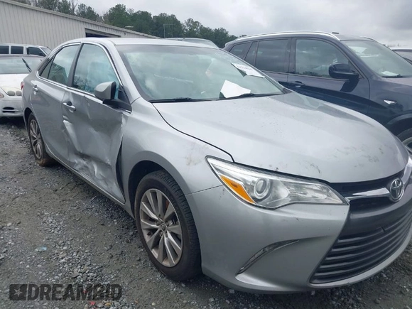 2015 Toyota Camry XLE with VIN 4T1BF1FKXFU955780, listed as a IAAI auction lot 41731667 with 210,750 mi miles and . Bid and sale history available at DreamBid. Image 1.