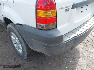 2006 Ford Escape XLT with VIN 1FMYU03176KC35659, listed as a IAAI auction lot 41434315 with 133,746 mi miles. Bid and sale history available at carsss.com. Image 6.