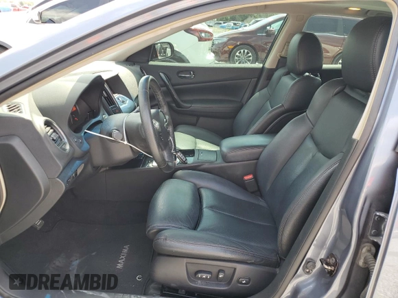 2010 Nissan Maxima SV z VIN 1N4AA5AP0AC829036, wystawiony jako Copart lot #56487895 z przebiegiem 117 783 mil mil oraz Szkoda całkowita • Salvage title. Historia ofert i sprzedaży dostępna na DreamBid. Obrazek 7.