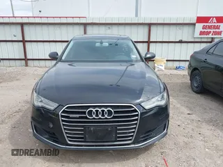 2016 Audi A6 2.0T Premium Plus with VIN WAUGFAFC1GN012799, listed as a IAAI auction lot 42141346 with 101,506 mi miles. Bid and sale history available at carsss.com. Image 12.