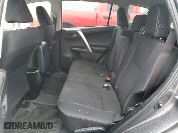 2018 Toyota RAV4 XLE with VIN JTMRFREV0JJ200337, listed as a Copart auction lot 84901594 with 57,301 mi miles and Salvage Title. Bid and sale history available at DreamBid. Image 10.