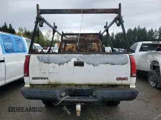 2000 GMC Sierra 1500 with VIN 1GTGC34R2YR191556, listed as a Copart auction lot 52346615 with Not Provided miles and Salvage Title. Bid and sale history available at DreamBid. Image 6.