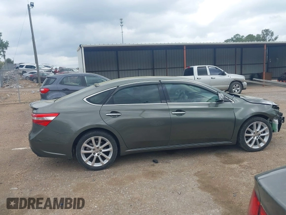 2013 Toyota Avalon XLE with VIN 4T1BK1EBXDU067394, listed as a IAAI auction lot 41944775 with 146,216 mi miles and . Bid and sale history available at DreamBid. Image 14.