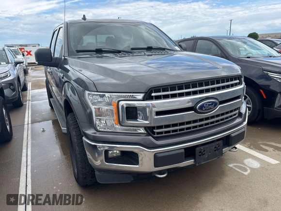 2018 Ford F-150 XL with VIN 1FTEW1EG5JFC77113, listed as a IAAI auction lot 42154366 with 185,929 mi miles. Bid and sale history available at carsss.com. Image 1.