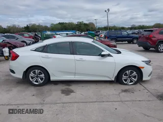 2020 Honda Civic LX with VIN 2HGFC2F69LH521681, listed as a IAAI auction lot 41664332 with 37,038 mi miles and . Bid and sale history available at DreamBid. Image 13.