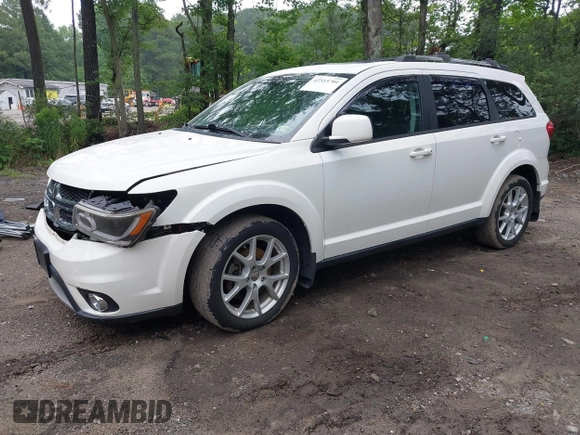 2015 Dodge Journey SXT with VIN 3C4PDCCG2FT690956, listed as a IAAI auction lot 42515701 with 145,676 mi miles and . Bid and sale history available at DreamBid. Image 2.