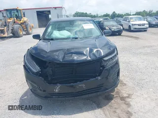 2023 Chevrolet Equinox LT with VIN 3GNAXJEG2PL215136, listed as a IAAI auction lot 42410962 with 61,490 mi miles and . Bid and sale history available at DreamBid. Image 12.