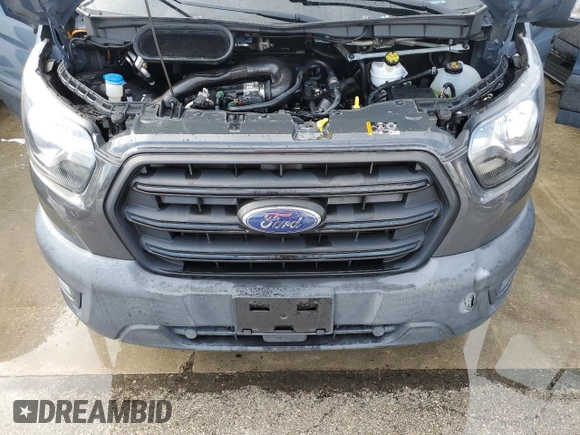 2020 Ford Transit Cargo with VIN 1FTBR3X86LKA47912, listed as a Copart auction lot 74428244 with Not Provided miles and Salvage Title. Bid and sale history available at DreamBid. Image 12.