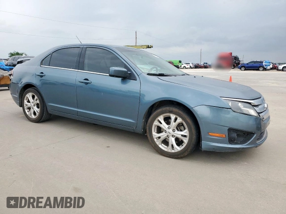 2012 Ford Fusion SE with VIN 3FAHP0HA6CR448068, listed as a Copart auction lot 57685955 with 168,134 mi miles and Salvage title. Bid and sale history available at DreamBid. Image 4.