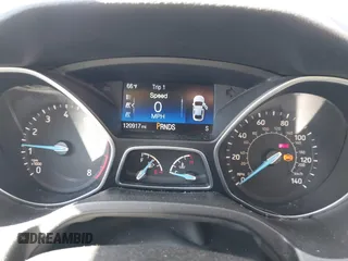 2015 Ford Focus Titanium with VIN 1FADP3J25FL333743, listed as a IAAI auction lot 41857057 with 120,917 mi miles and . Bid and sale history available at carsss.com. Image 7.