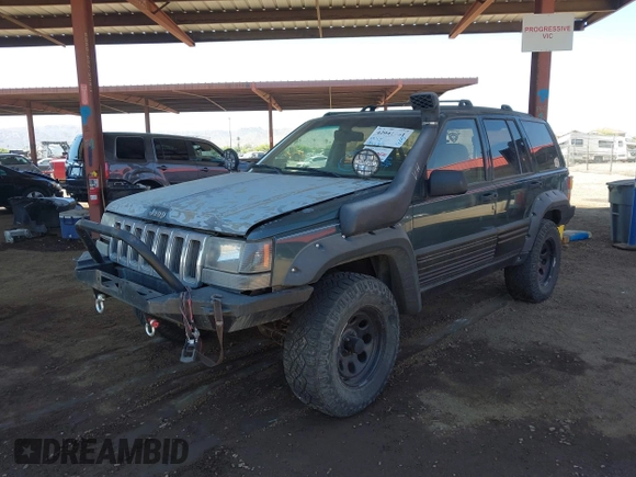 1994 Jeep Grand Cherokee Laredo with VIN 1J4GZ58S4RC280650, listed as a IAAI auction lot 42041261 with 199,265 mi miles and . Bid and sale history available at DreamBid. Image 17.