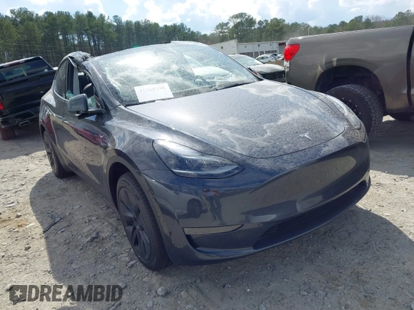 2025 Tesla Model Y Long Range with VIN 7SAYGDED3SA352138, listed as a IAAI auction lot 41760798 with 1,209 mi miles and . Bid and sale history available at DreamBid. Image 1.