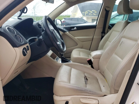 2013 Volkswagen Tiguan SE with VIN WVGAV7AX1DW527053, listed as a Copart auction lot 55934895 with 202,761 mi miles and Clean title. Bid and sale history available at DreamBid. Image 7.