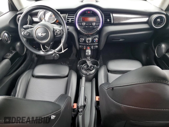 2014 MINI Hardtop S with VIN WMWXM7C57ET987069, listed as a Copart auction lot 52147955 with 121,276 mi miles and Salvage Title. Bid and sale history available at DreamBid. Image 8.