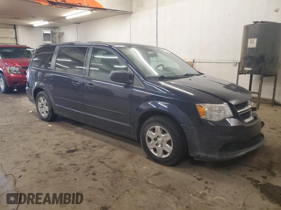 2012 Dodge Grand Caravan SE with VIN 2C4RDGBG2CR333664, listed as a Copart auction lot 46734485 with 211,138 mi miles and Salvage Title. Bid and sale history available at DreamBid. Image 4.