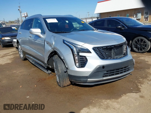 2019 Cadillac XT4 FWD Premium Luxury with VIN 1GYFZCR47KF110481, listed as a IAAI auction lot 41771338 with 103,124 mi miles. Bid and sale history available at carsss.com. Image 1.