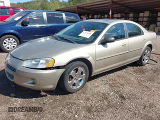 2002 Dodge Stratus z VIN 1B3AL56R62N154704, wystawiony jako IAAI lot #41879628 z przebiegiem 91 193 mil mil oraz . Historia ofert i sprzedaży dostępna na DreamBid. Obrazek 2.